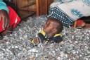 child in plastic used to make bags