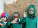 children waving