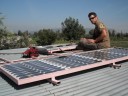 chris with solar panels