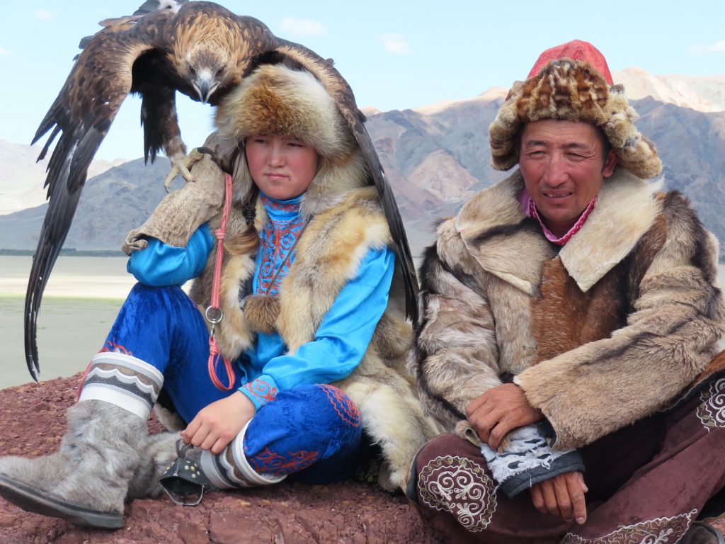 Amildee and her father Dayanbik, eagle hunters
